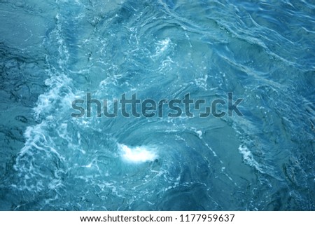 Water whirl in the slipstream of the ferry. Royalty-Free Stock Photo #1177959637