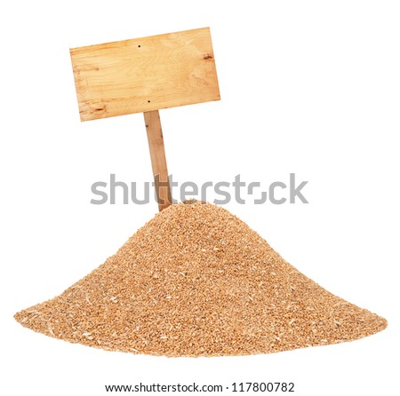 Heap of wheat grains with wooden price tag