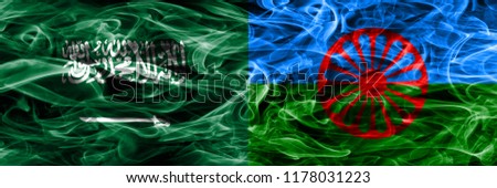 Saudi Arabia vs Gipsy smoke flags placed side by side. Thick colored silky smoke flags of Saudi Arabia and Gipsy