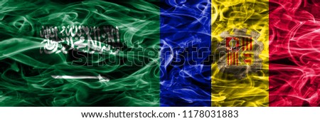 Saudi Arabia vs Andorra smoke flags placed side by side. Thick colored silky smoke flags of Saudi Arabia and Andorra