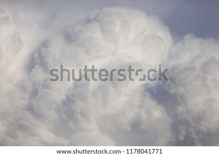 White creamy clouds in the sky as a background