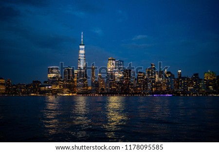 downtown Manhattan cityscape at night 