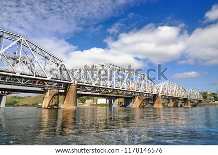 The railway bridge over the Yenisei River in the city of Krasnoyarsk in the summer.