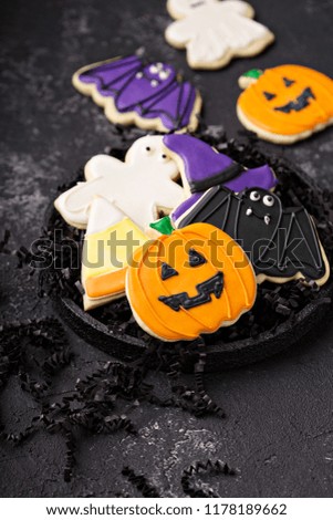 Halloween cookies in the shape of pumpkin, bat, ghost and candy corn
