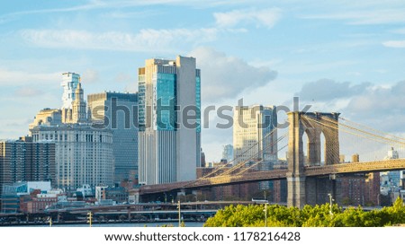 Famous Brooklyn Bridge with the downtown Manhattan skyline at the background. New York City, USA.