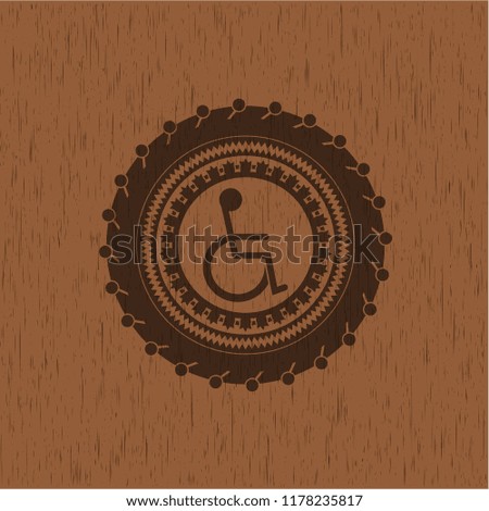 disabled (wheelchair) icon inside wood signboards