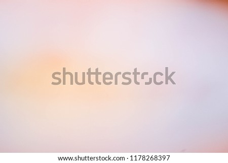White and orange blur background