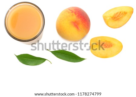 glass of peach juice with peach fruit, green leaf and slices isolated on white background. top view