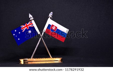 Australia and Slovakia table flag with black Background