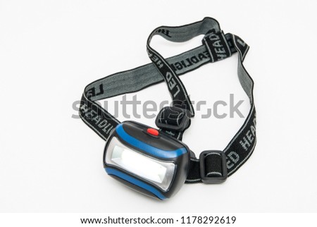 LED headlamp for fixing on head Royalty-Free Stock Photo #1178292619
