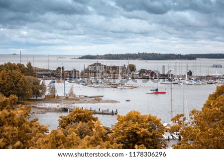 Beautiful city and sea landscape, Helsinki, view of the sea and the port with fakes in the autumn period