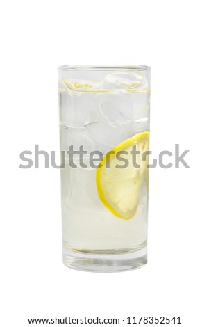 A single-colored transparent cocktail, refreshing in a tall glass with ice cubes and lemon slices. Side view Isolated white background. Drink for the menu Royalty-Free Stock Photo #1178352541