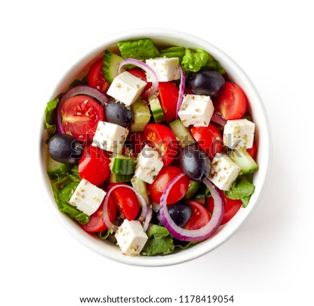 Greek salad in paper bowl for take away, isolated on white background, top view