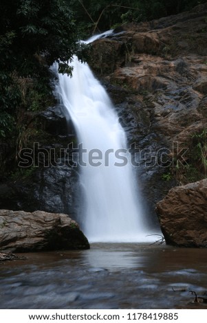 The landscape photography of waterfall in northern Thailand.