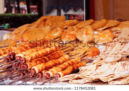 close-up. Exhibition, sale of the flour products prepared on a grill. Street festival of food. Concept Picnic, Holiday, Festivities