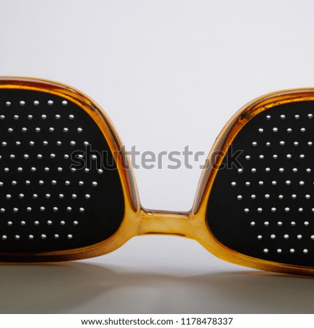 glasses with a black retina on a light background. Element of design. Web banner.