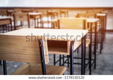 School empty classroom, Lecture room with desks and chairs iron wood for studying lessons in highschool thailand without young student, interior of secondary education with whiteboard Royalty-Free Stock Photo #1178530120