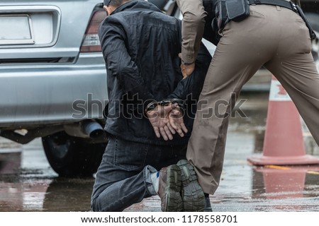 Police steel handcuffs,Police arrested,Police arrested the wrongdoer. Royalty-Free Stock Photo #1178558701