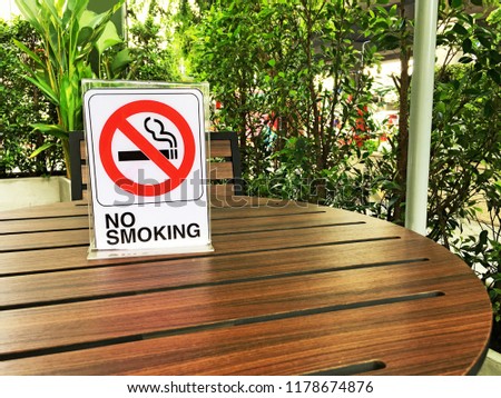"No smoking" sign on the table in the public areas.