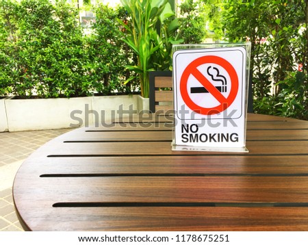 "No smoking" sign on the table in the public areas.