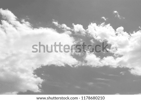 black clouds on a gray background