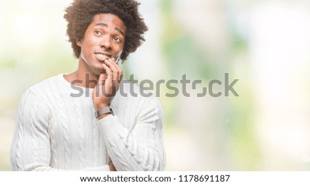 Afro american man over isolated background thinking looking tired and bored with depression problems with crossed arms.