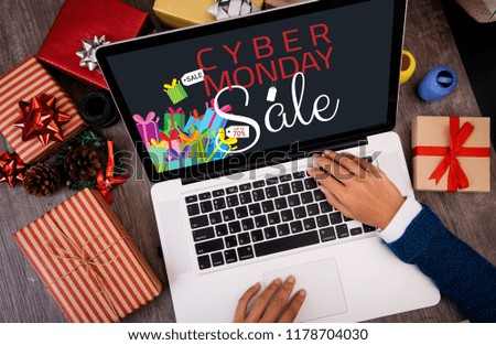 Cyber Monday text on laptop computer. Holiday online shopping christmas day concept. 