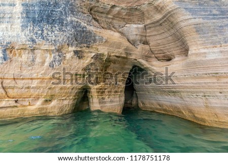 A cave under Miners Castle on Lake Superior near Munising Michigan. Miners Castle is part of Pictured Rocks National Lakeshore