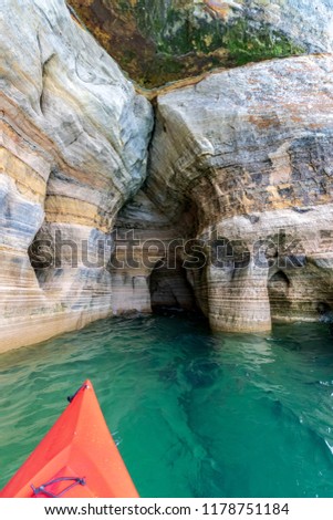 Red Kayak and underwater view of a sea cave under Miners Castle on Lake Superior, near Munising's Pictured Rocks National Lakeshore in the Upper Peninsula of Michigan