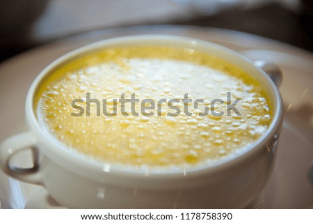 chicken broth in a Cup