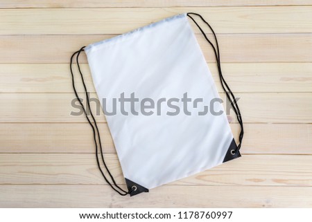 White drawstring pack template, mockup of bag for sport shoes Royalty-Free Stock Photo #1178760997