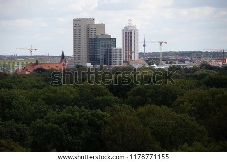 Panorama of the city of Leipzig with tall buildings, town hall and churches