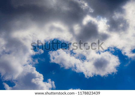 White grey clouds on blue sky