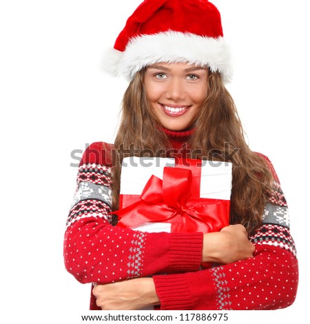 christmas girl, young beautiful smiling young woman in santa's hat over white background