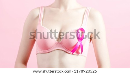 woman wear pink ribbon with prevention breast cancer concept
