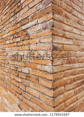 brick wall of red color of masonry

ancient centuries old