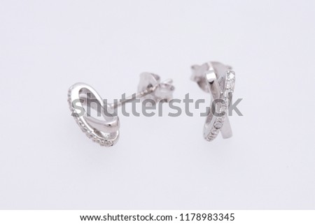 Fashion earring on white background