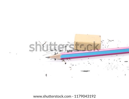 Graphite pencil and eraser with shavings isolated on white background