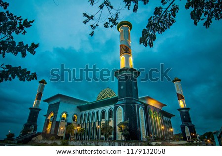 Al Munawar Mosque, great mosque in Ternate, North Mollucas, Indonesia, a unique mosque that look like floating on the water. Royalty-Free Stock Photo #1179132058