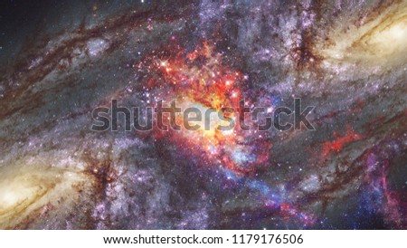 Glowing spiral galaxy. Darkness light. Elements of this Image furnished by NASA.