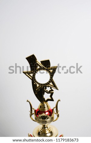 Trophy for champion isolated in white background. Concept of winning in competition, contest or tournament.