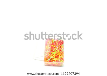 Rubber band in box  on white background