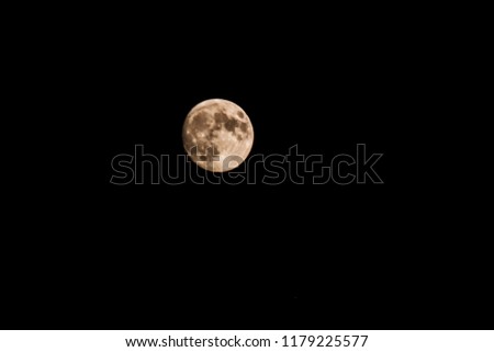 The moon in color on black bakground isolated