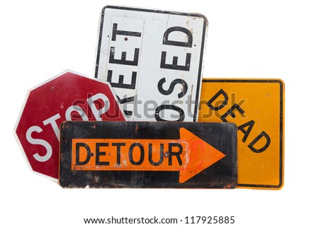 Assorted Road signs including dead end, stop, detour and street closed on a white background
