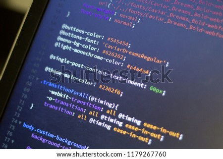 Web development code: CSS/LESS styles preprocessor script lines. Abstract screen of web developer.