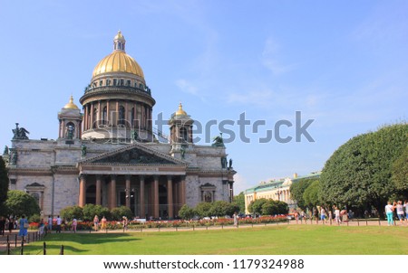 Vintage Style Photo of Saint Isaac's Cathedral in St. Petersburg, Russia on Summer Day. Church Building Facade Architecture, Saint Isaac Cathedral Russian Travel Attraction on Blue Sky Background