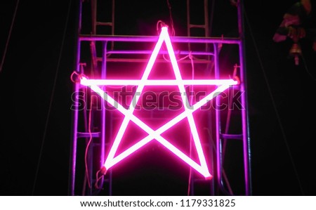 pink star neon in the local festival 