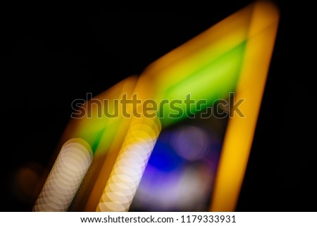 Blurred bokeh background colorful abstract neon lights. Defocused Blurry Night life, Night Club or Bar Background concept image. 