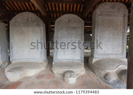 The ancient Vietnamese carved stone slab (Turtle stelae or Turtle stone) at Temple of Literature (Vietnam's first national university built in 1070), Hanoi, Vietnam