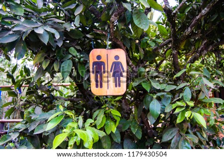 Outdoor restroom, bathroom public signpost 